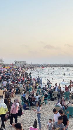families on Gaza Beach before the war